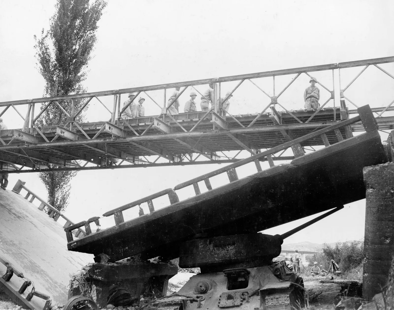 Korean Army engineers erect a Bailey above a destroyed bridge near the Naktong, 27 September 1950.